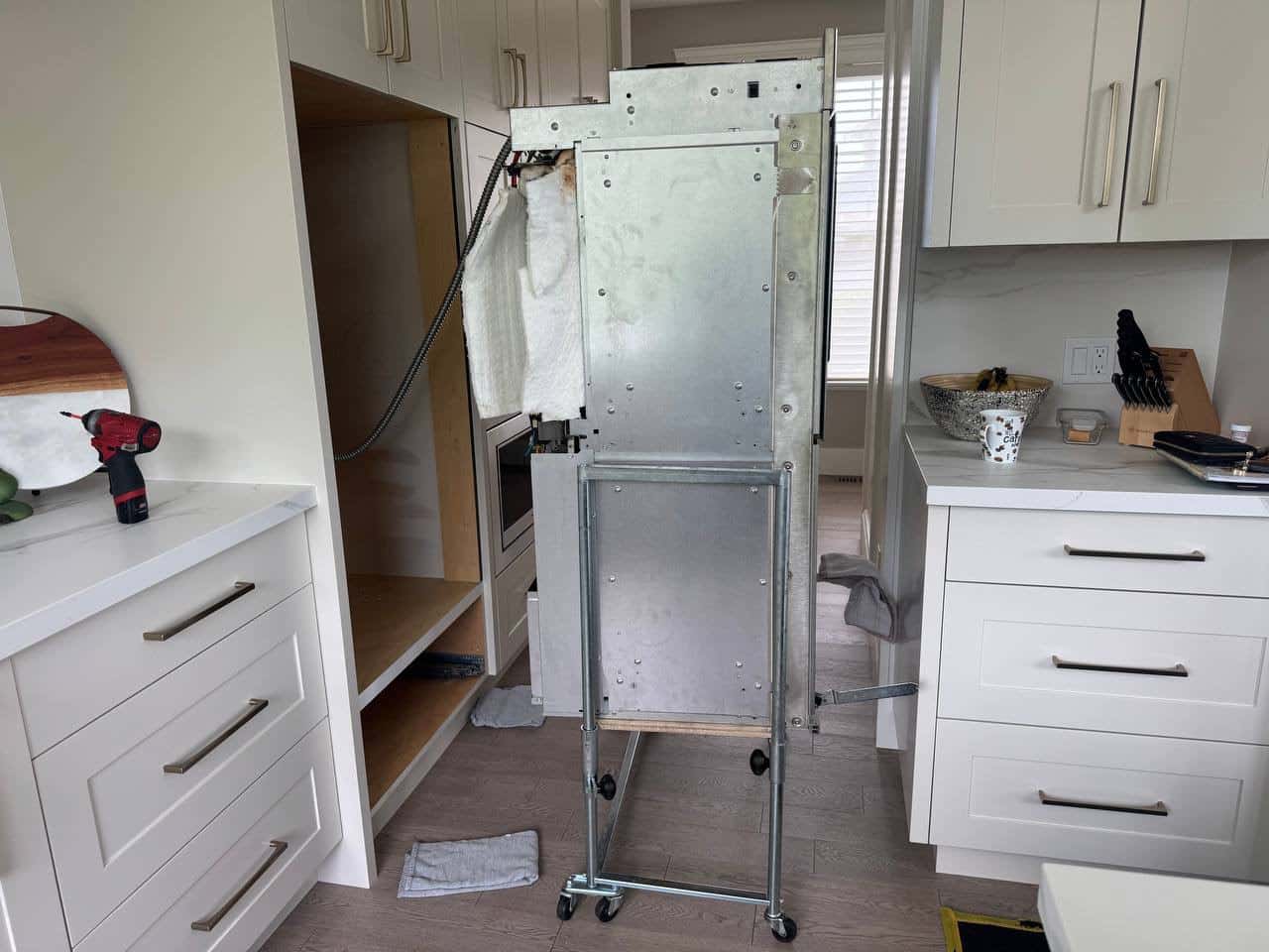 Appliance Installation Vancouver preparing double wall oven for installation