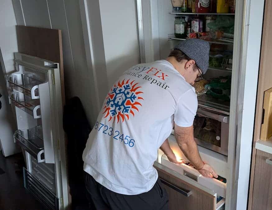 EasyFix Appliance Repair technician Vlad repairing a Liebherr built-in refrigerator in Vancouver